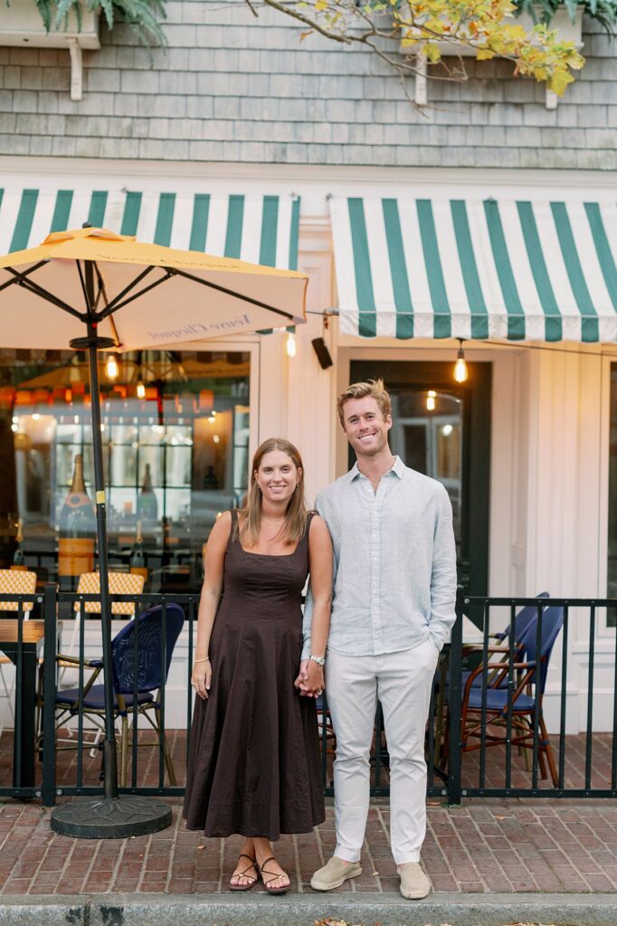 Couple strolling downtown Edgartown near the waterfront restaurants and shops